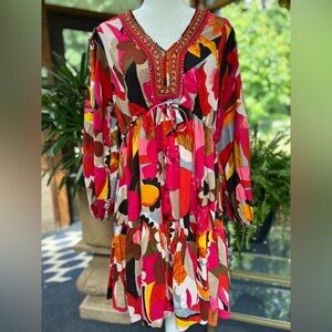 Cotton boho dress with geometric/floral pattern, draw string waist. Size medium.